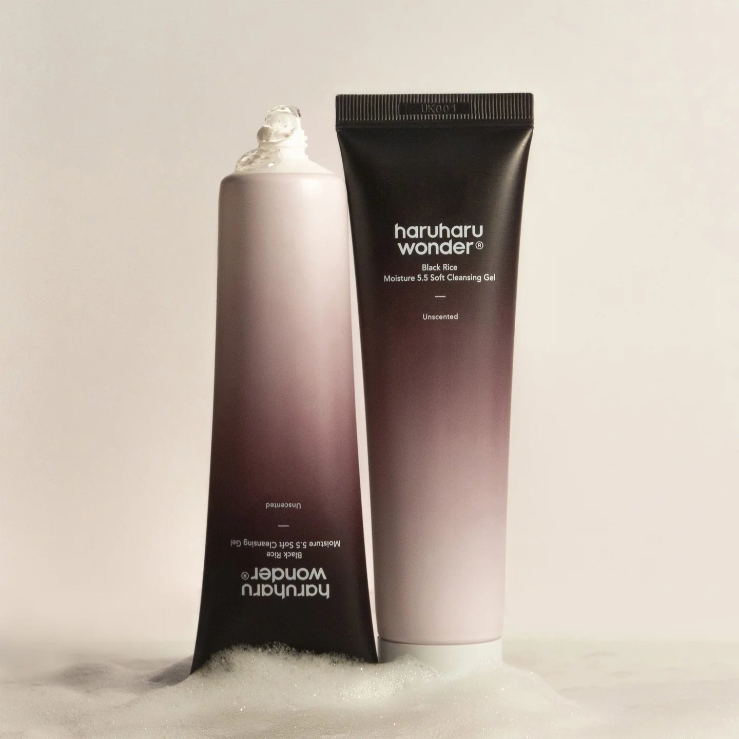 Haruharu Wonder Black Rice Moisture 5.5 Soft Cleansing Gel placed in foam, product tube with creamy texture